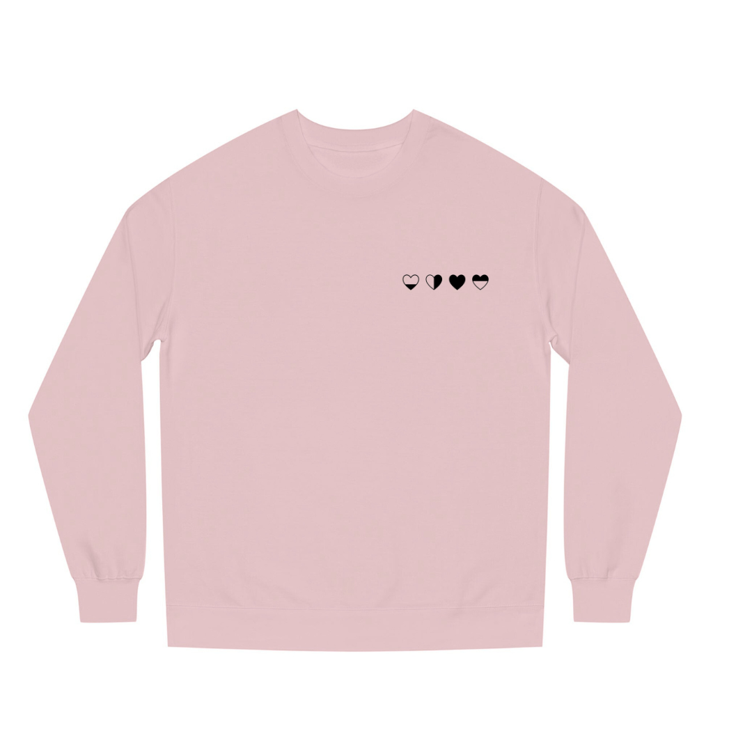 Pink Heart Sweater with four embroidered hearts, symbolizing that every emotion is valid — made from soft bamboo cotton by HeartWear Co.