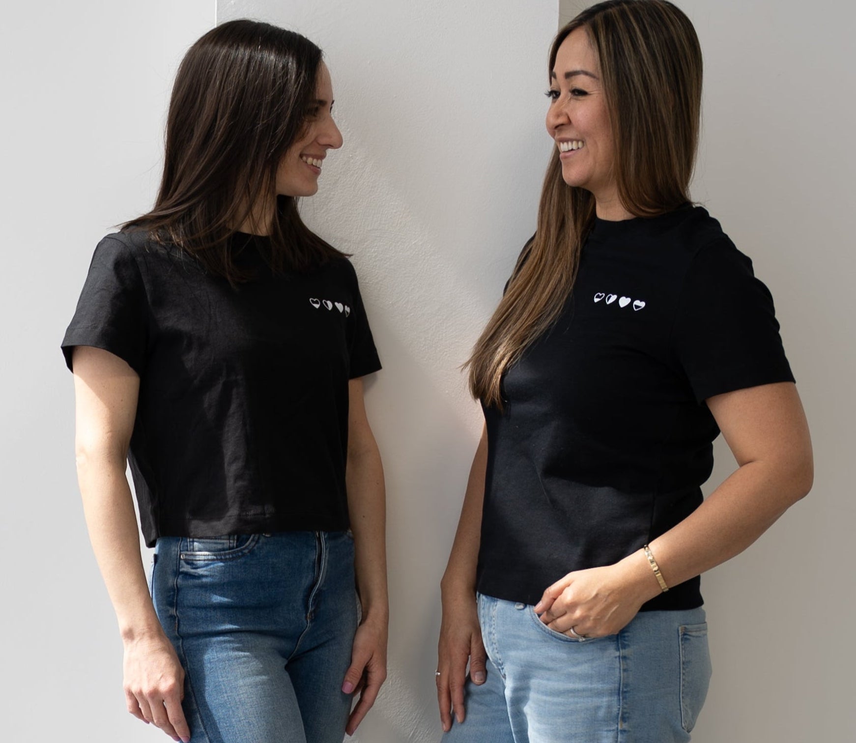 HeartWear Co. founders standing together, united by their journey through grief and healing