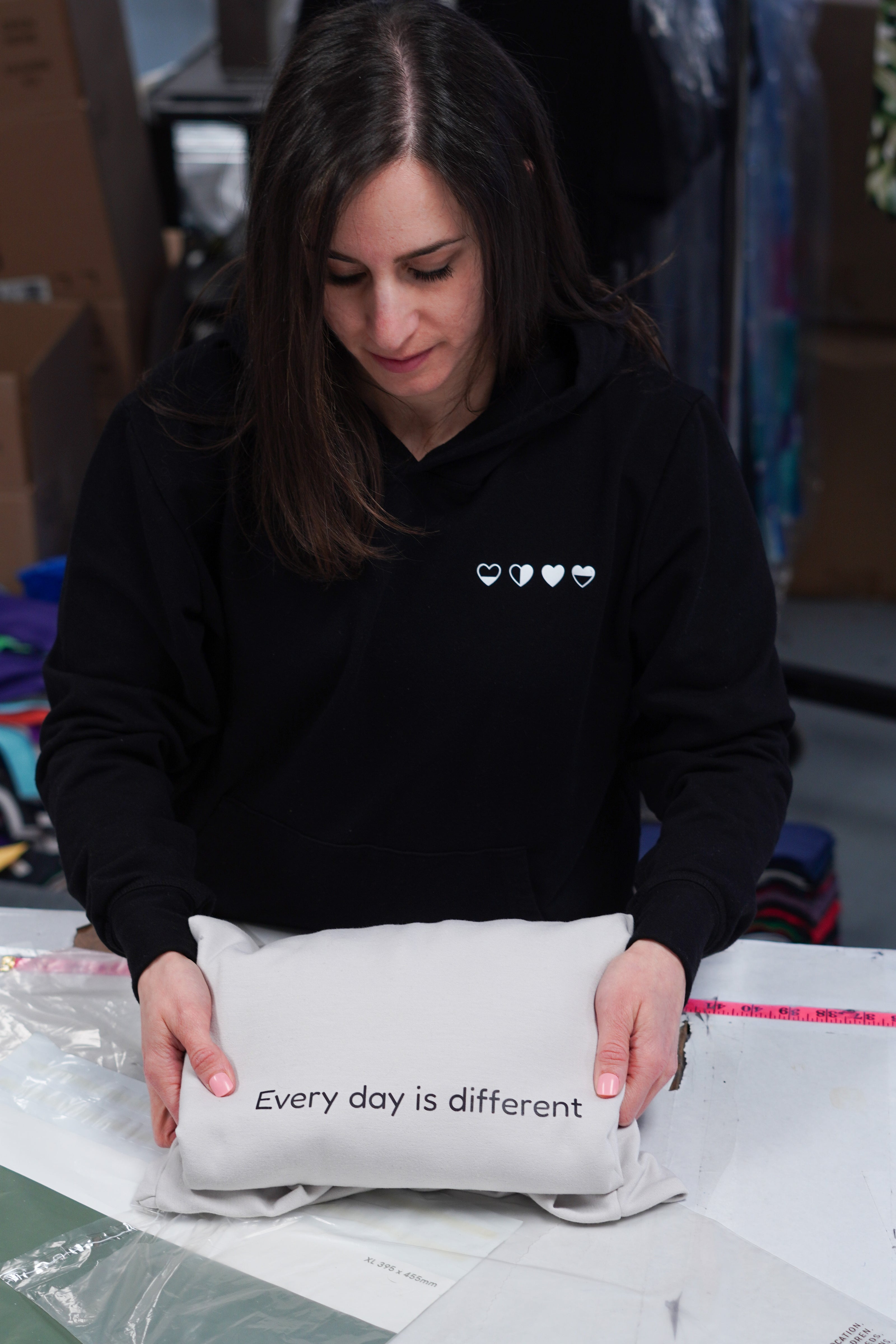 Woman wearing soft self-care clothing designed for grief and mental health support
