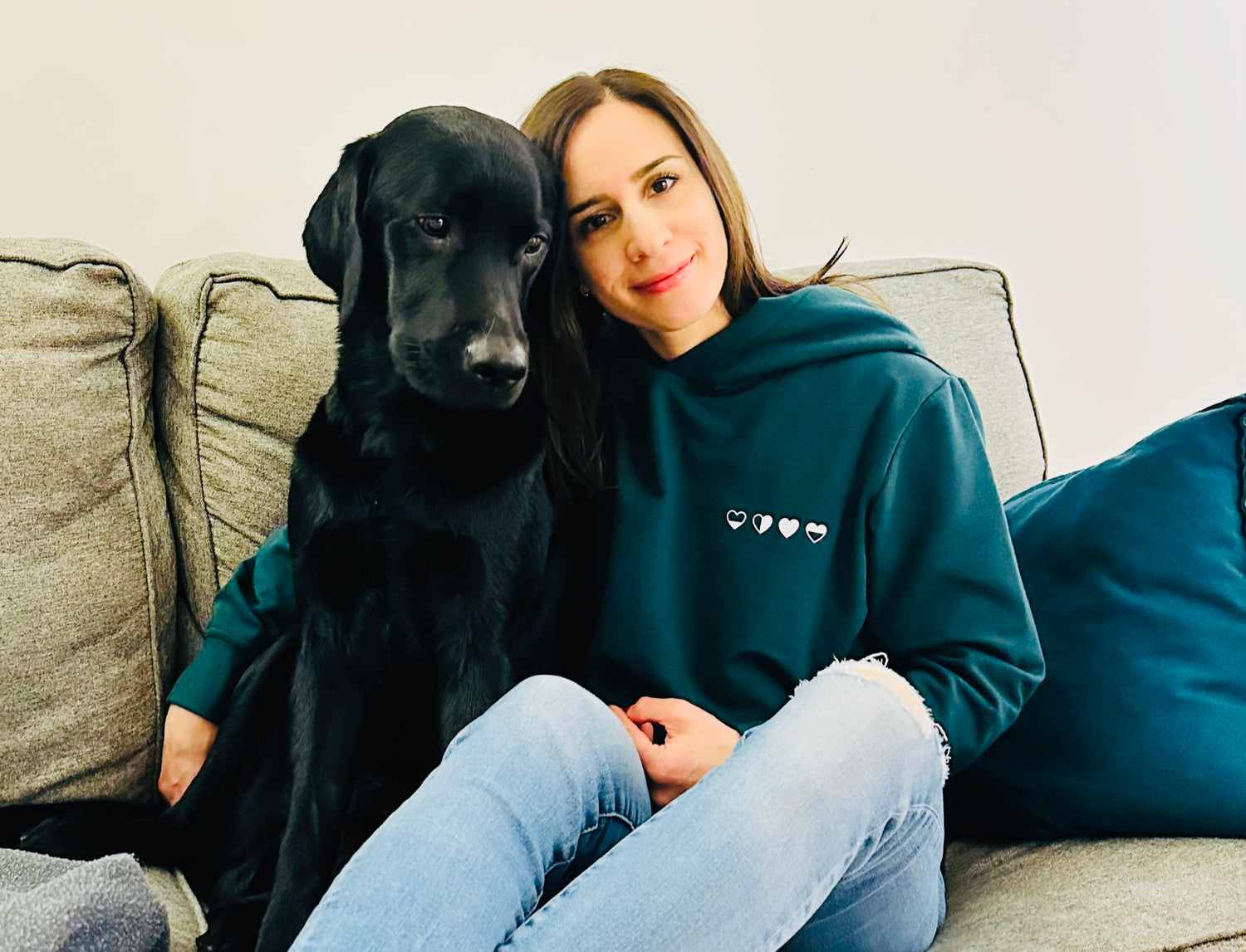 Healing Hearts hoodie from HeartWear Co., featuring four-heart logo that symbolizes emotional healing and mental health awareness.