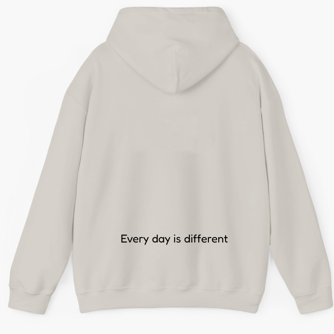 Back view of Healing Hearts stone hoodie with ‘Every day is different’ embroidered mantra