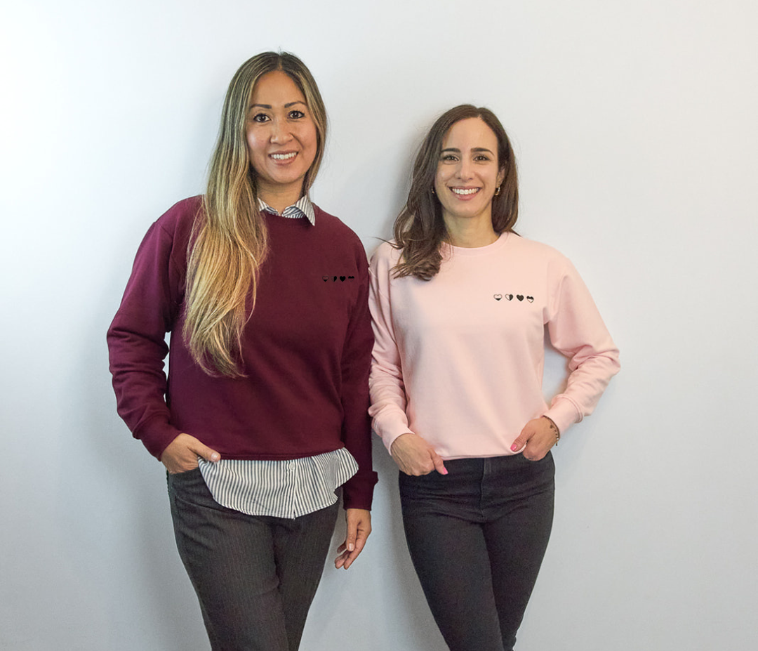 HeartWear Co. founders standing together, united by their journey through grief and healing
