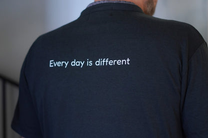 Men’s “Every day is different” t-shirt by HeartWear Co. – a meaningful gift for him, combining comfort and emotional resilience.